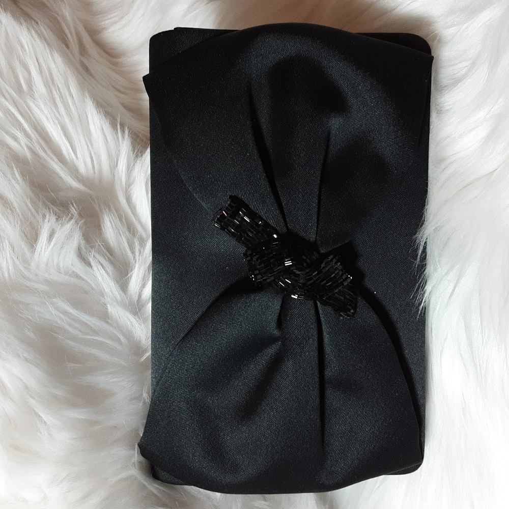 Small clutch with shoulder strap